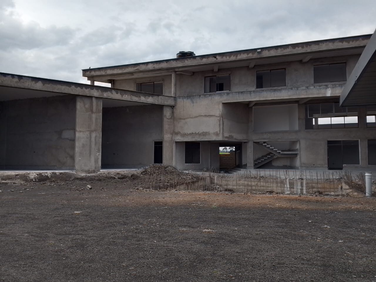 UNFINISHED PETROL STATION SITTING ON 1 ACRE PIECE OF LAND