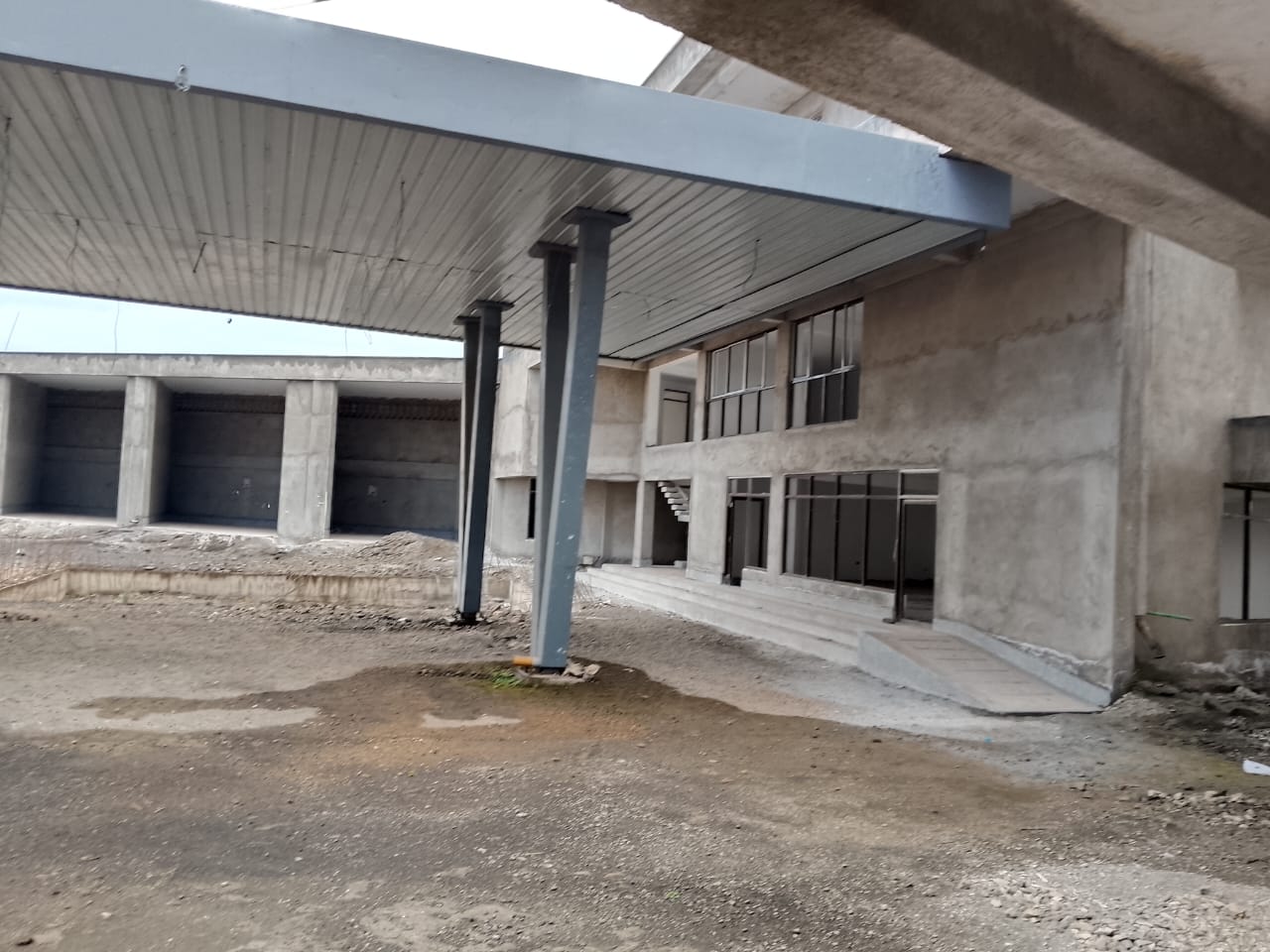 UNFINISHED PETROL STATION SITTING ON 1 ACRE PIECE OF LAND